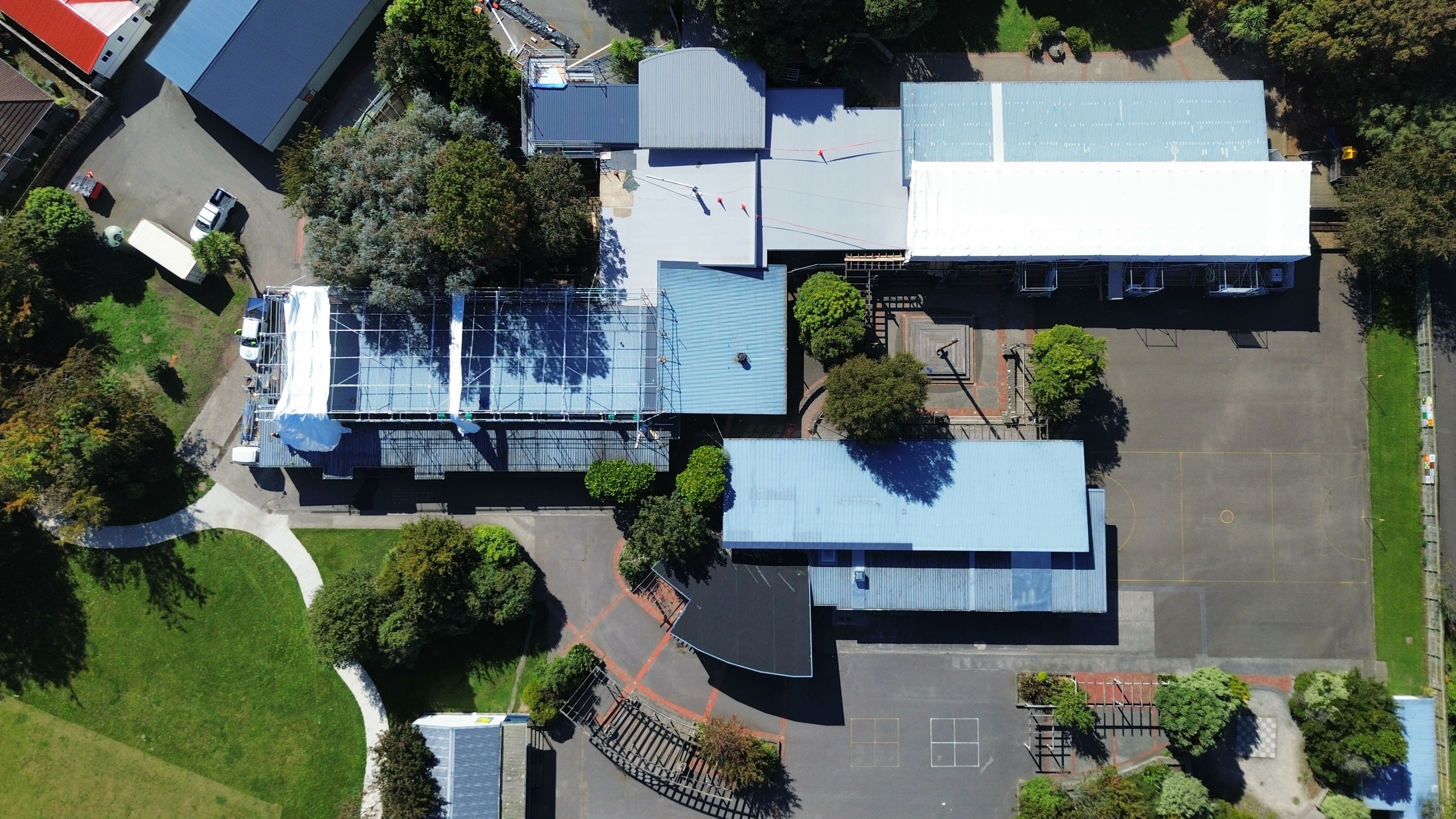 Aerial overview of Avalon Primary School scaffolding and shrinkwrap project, Avalon, Lower Hutt