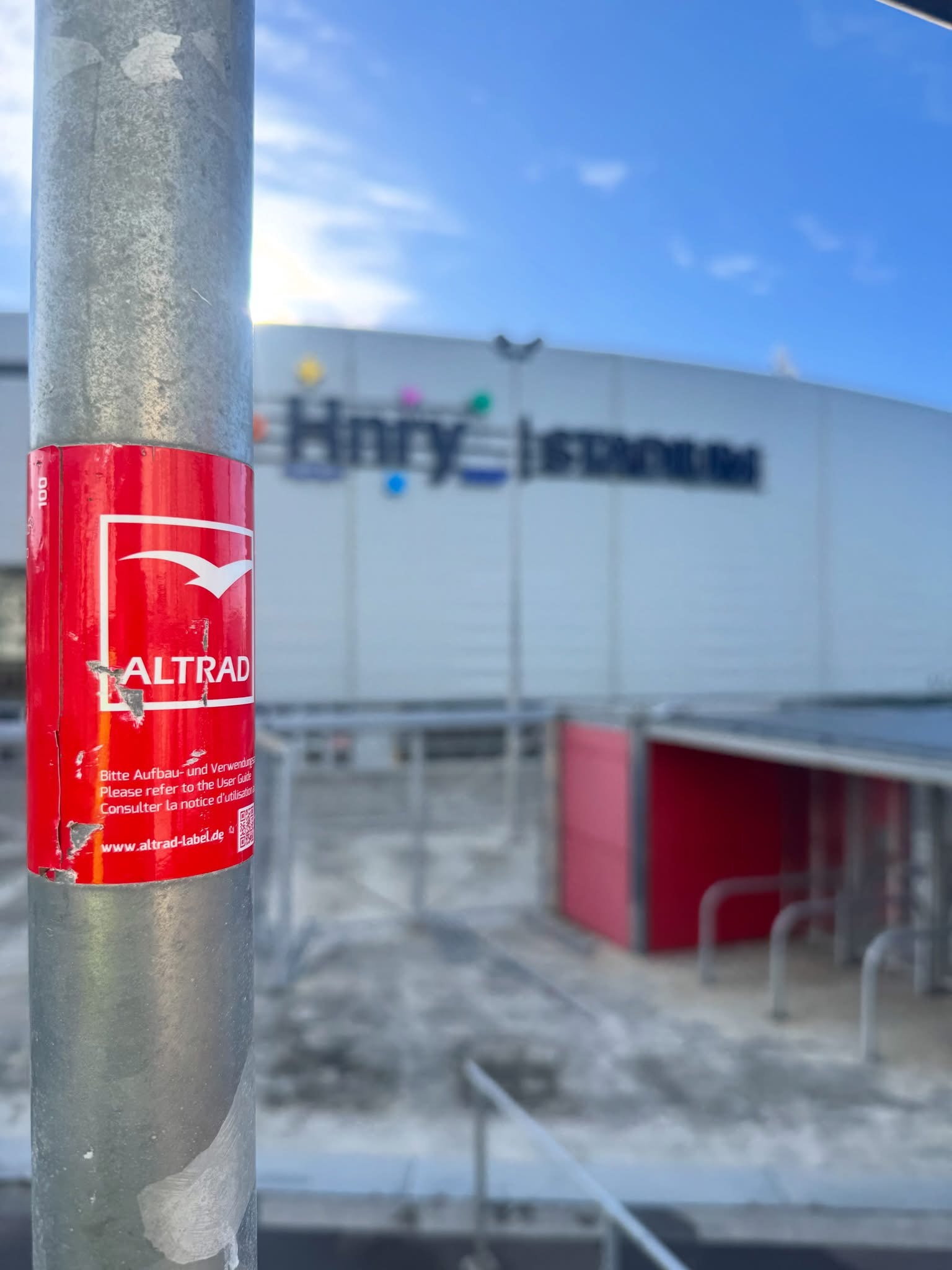 Erect It Scaffolding branded pole label on site at HNRY Stadium, Wellington, ahead of the membrane roof replacement edge protection installation
