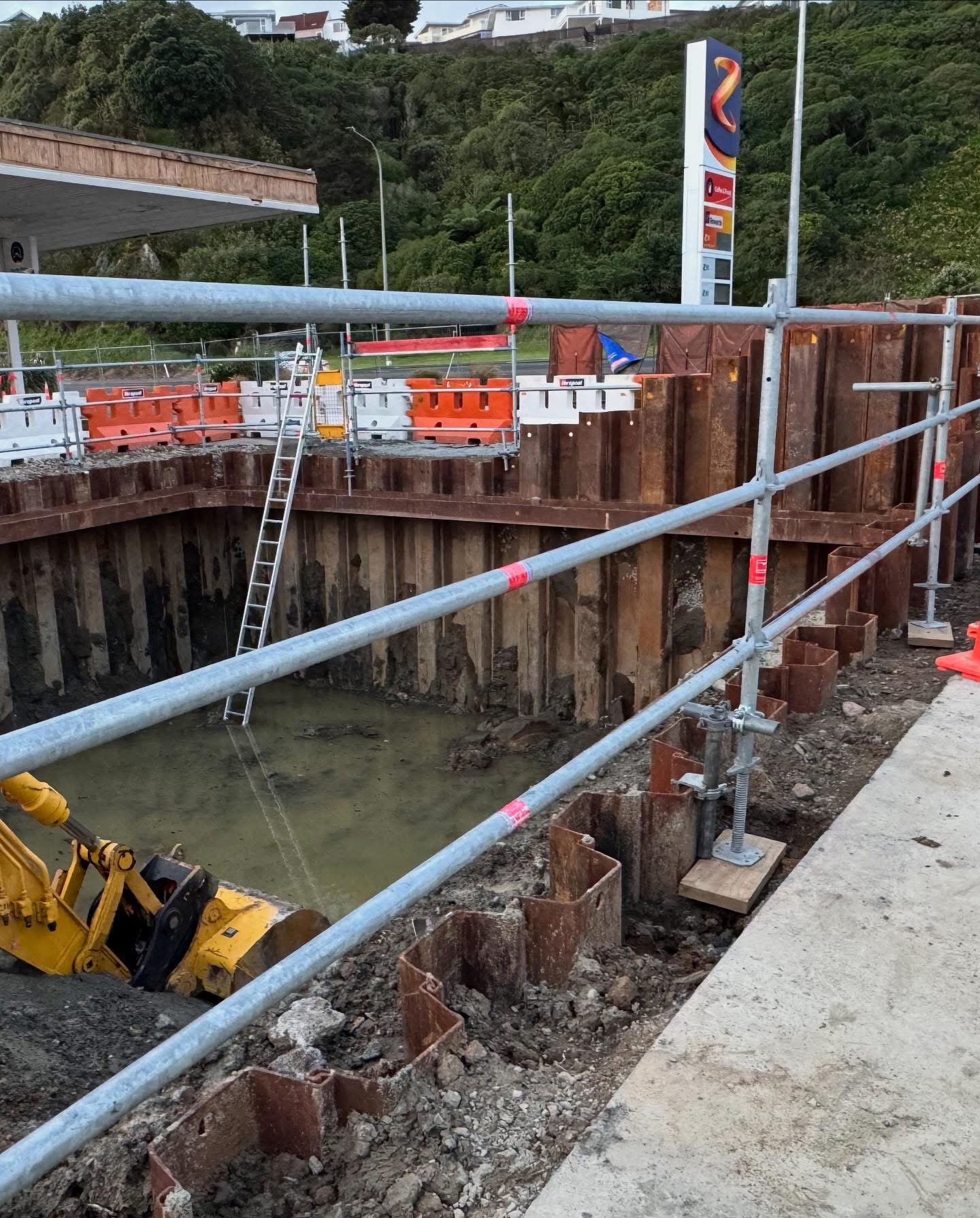 Industrial scaffolding edge protection for underground fuel tank installation at Z Station Mana, Porirua — Erect It Scaffolding