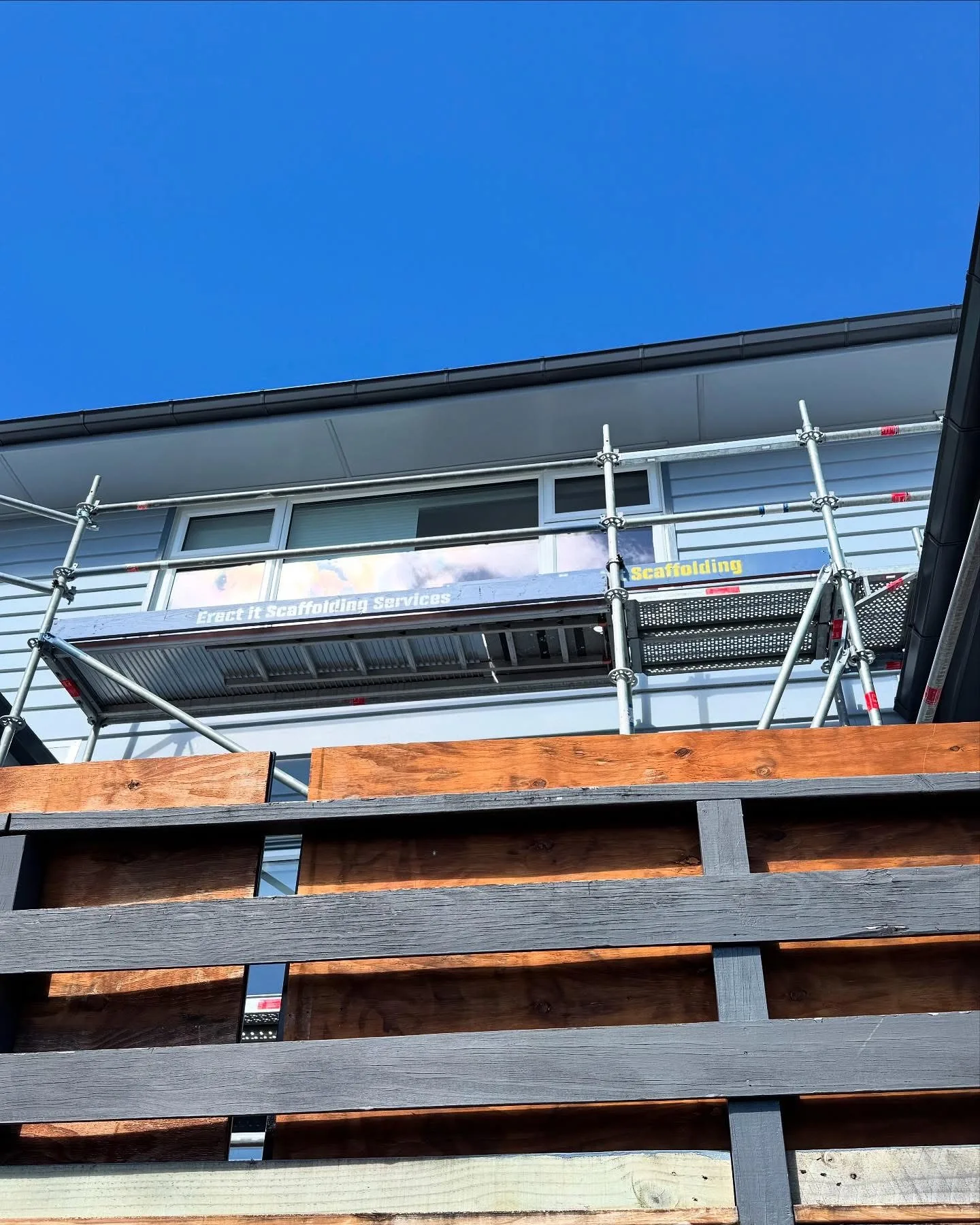 Elevated working platform and guardrails around the Waiwhetū exterior